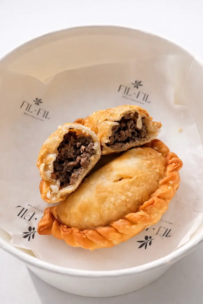 Beef sambousik, a crispy hand pie filled with seasoned ground beef, at Fil Fil Mediterranean in Homer Glen, IL.