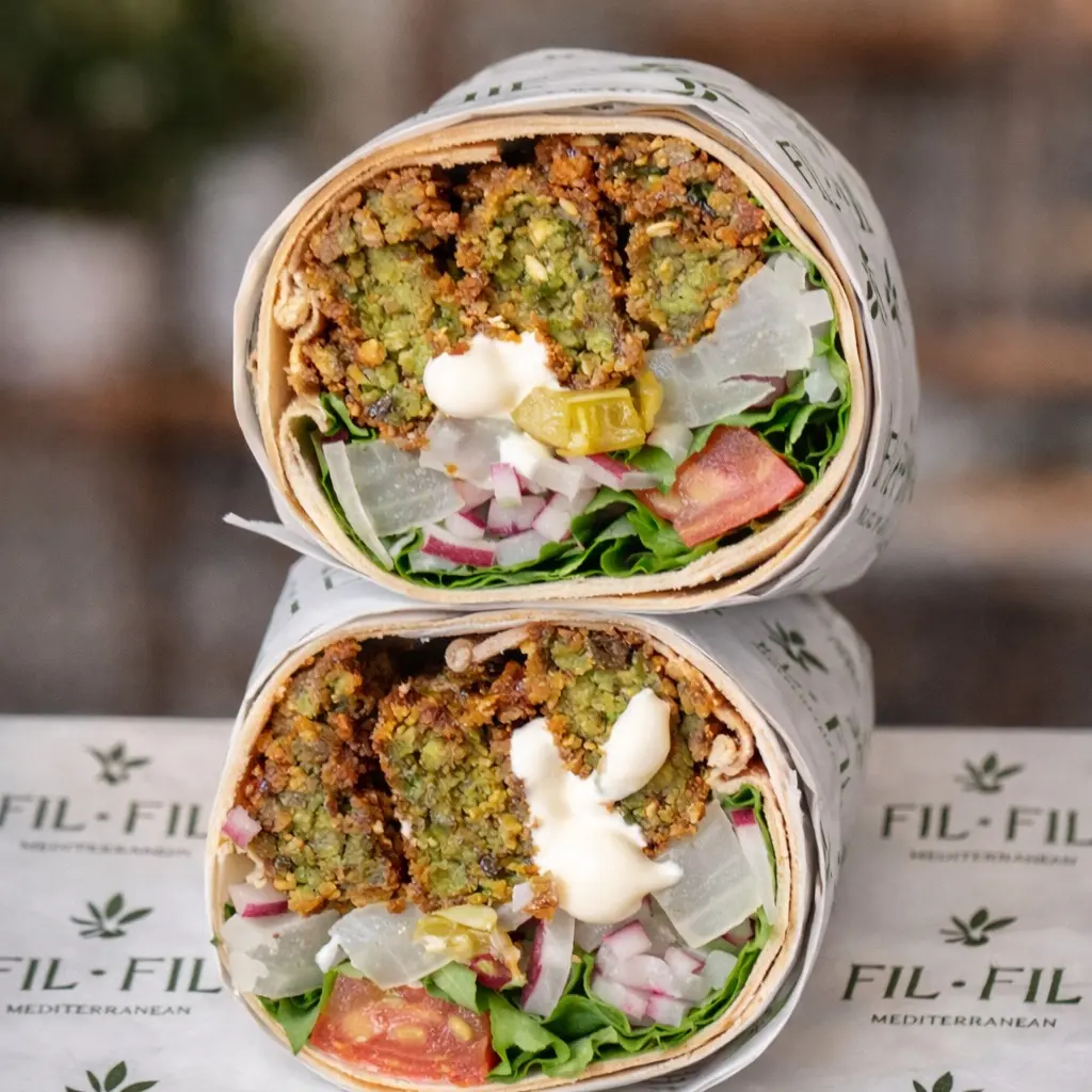 Crispy falafel wrap with tahini and pickled cucumbers at Fil Fil Mediterranean in Homer Glen, IL.